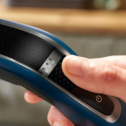 PHILIPS Series 5000 Επαναφορτιζόμενη Κουρευτική Μηχανή με 28 Ρυθμίσεις Μήκους 0,5-28mm, Τεχνολογία Trim-n-Flow PRO, DualCut & έως 75 Λεπτά Χρόνο Λειτουργίας HC5612/15