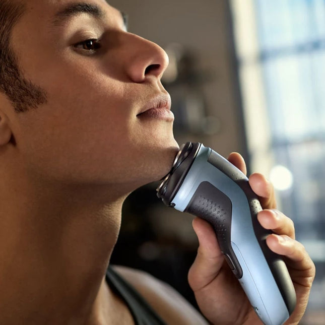 PHILIPS 3000X Series Επαναφορτιζόμενη Περιστρεφόμενη Ξυριστική Μηχανή Προσώπου με 27 Αυτοακονιζόμενες Λεπίδες, Κεφαλές 4D Flex, Αδιάβροχη & έως 40 Λεπτά Χρόνο Λειτουργίας X3003/00